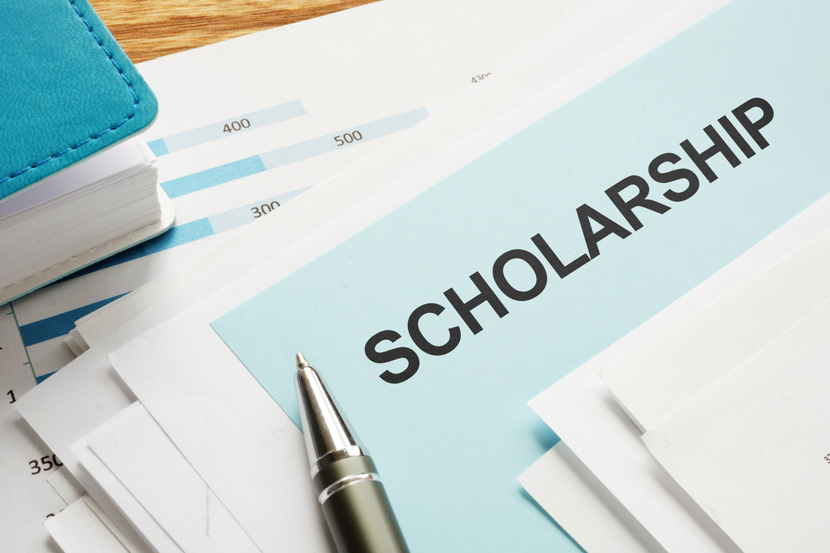 Text sign showing hand written words Scholarship